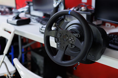 Sim racing steering wheel mounted on desk